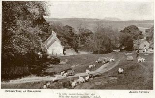 Image shows a very old photograph taken by photographer James Patrick during the 1800's of the cottages of Swanston Village in Spring time with sheep and lambs with the shepherd. Arthur's Seat is also included in the distance.
